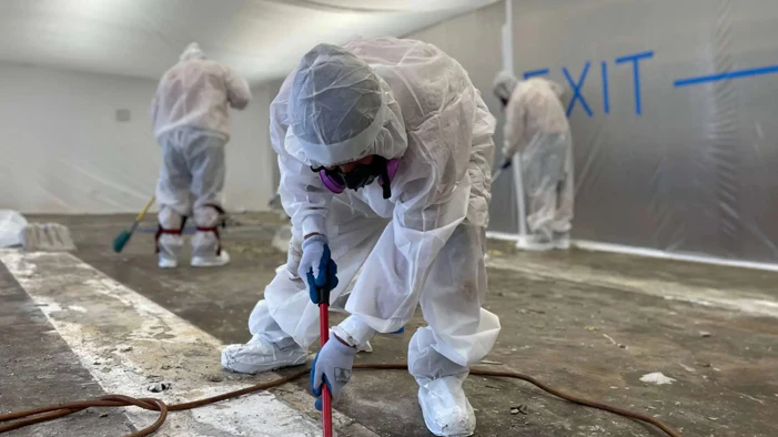 Licensed asbestos abatement and containment